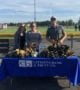 CB Team at Hutch Tiger Football Game handing out CB Koozies